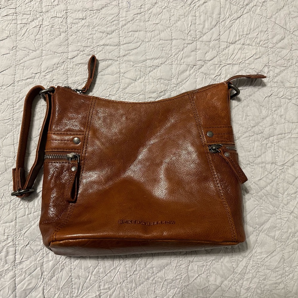Spikes and Sparrow clutch leather bag/wristlet